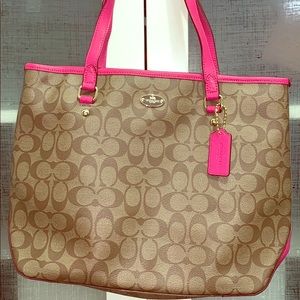 Pink and tan coach purse